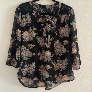 Quarter sleeve semi sheer floral top